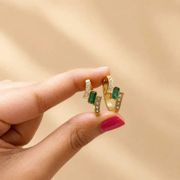 Emerald spark oval hoops